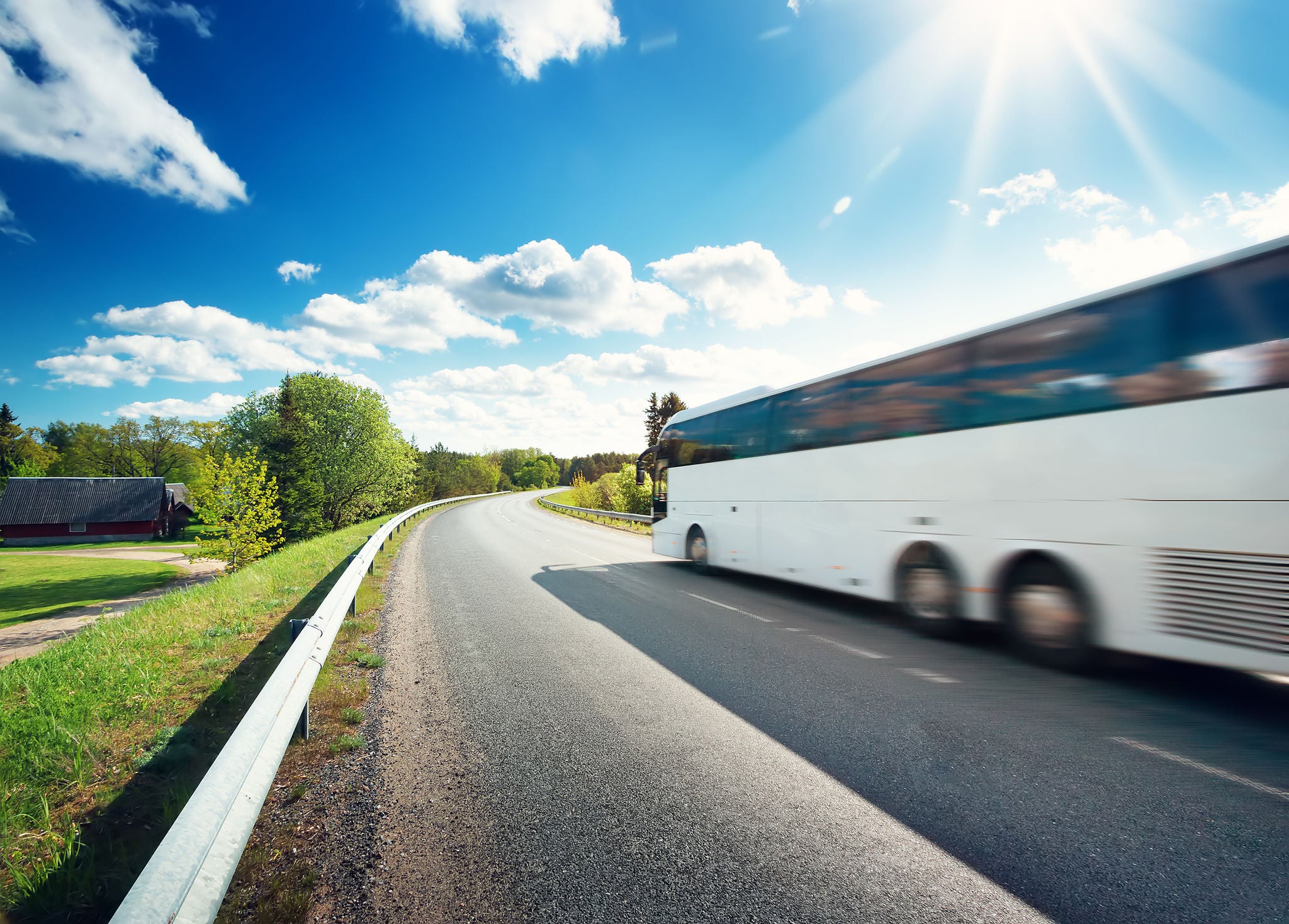 White bus in the sunlight