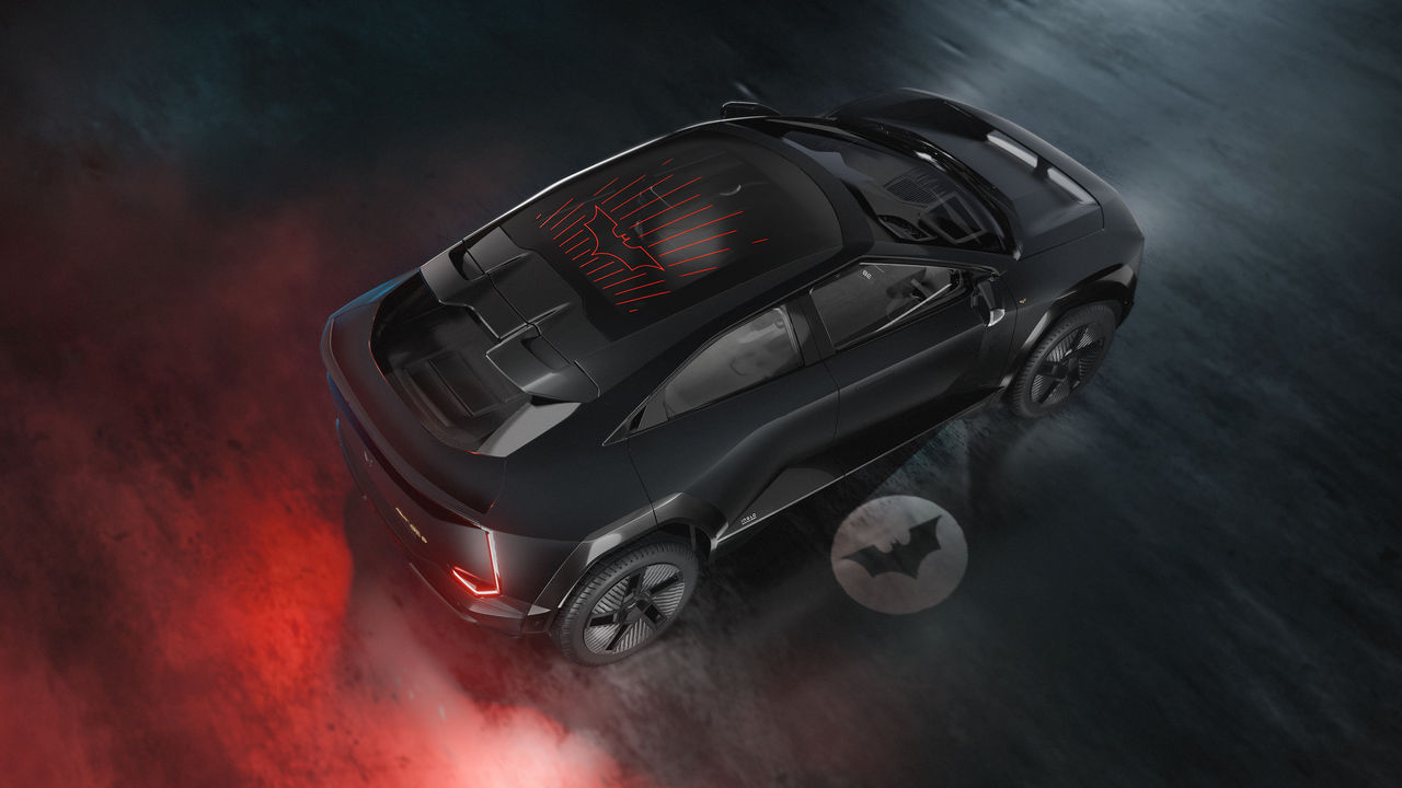 Newsroom asset: Webasto-developed Batman-inspired illuminated roof for Mahindra SUV, showcasing a glass roof graphic and ground projection lighting.
